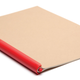 Illustration for article titled A Clip That Turns Any Stack of Paper Into a Homemade Notebook